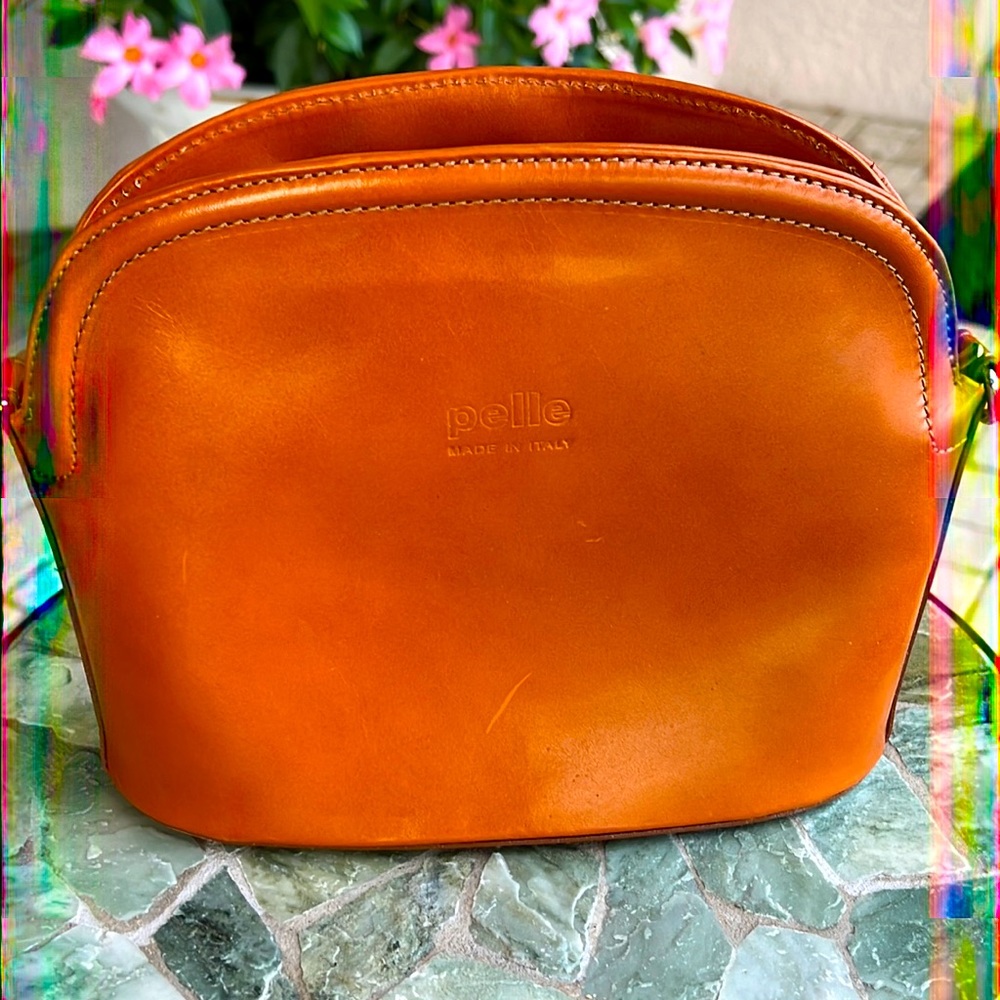 New leather Camel color bag bought in Italy. Brand is Pelle made in Italy.